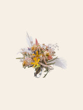 A decorative floral arrangement with vibrant flowers and leaves, highlighted by a striking yellow bloom on a simple background. Handcrafted in New York, it echoes the elegance of CAMELLIA's customizable Pisces Flower Ring.